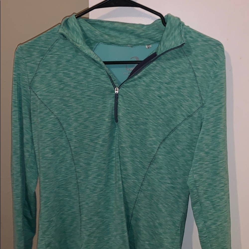 ZERO RESTRICTION teal workout shirt